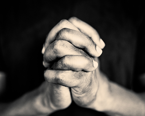 stock photo of praying hands